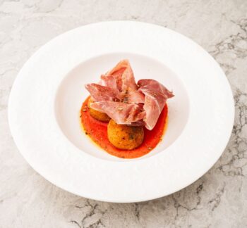 Arancini with Romesco Sauce and Prosciutto