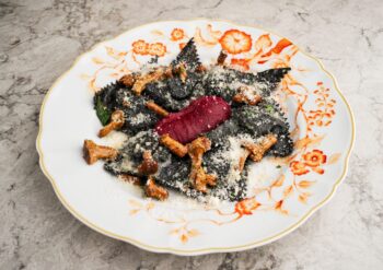 Ravioli with lamb and beetroot cream